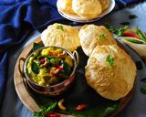 A picture of step 13 of Potato masala with poori.