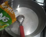 A picture of step 2 of Pineapple Popsicles.
