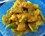 A picture of step 6 of Potato and Tomato Curry.