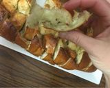 A picture of step 5 of Pull apart garlic cheesy bread.