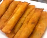 A picture of step 6 of Spaghettis and veg rolls.