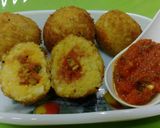 A picture of step 9 of Fried Sambhar Rice Balls with stuffed Concasse Sauce.