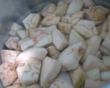 A picture of step 2 of Bhaingan Aloo Gravy.