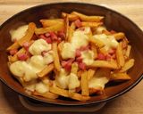 Une image de l'étape 8 de Poutine au Jambon.
