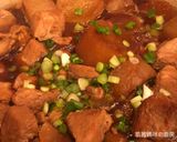 A picture of step 9 of Braised Pork with Daikon Radish.