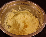 A picture of step 10 of Cinnamon Layer Cake with Whipped Cinnamon Cream Filling and Frosting.