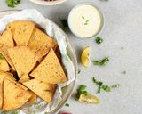 A picture of step 8 of Baked Missi Roti Nachos kuchumbar salsa kehri ki chutney.