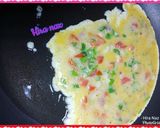 A picture of step 4 of Spicy Egg With Roti.