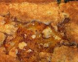 A picture of step 3 of Peach Cobbler with BlueBell Homemade Vanilla Ice Cream.