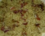 A picture of step 2 of Indomie pizza.