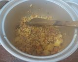 A picture of step 2 of Cauliflower, carrot and potato/ veg/ with salad and chapati.