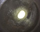 A picture of step 2 of Peri Peri Egg Beans Masala.