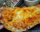 A picture of step 11 of Garlic bread with cheese.