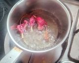 A picture of step 3 of Hibiscus flower Tea 🌸🌸☕🌸🌸.