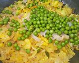 A picture of step 9 of Kaande Matar Pohe (Savory Flattened Rice With Green Peas).