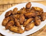 A picture of step 4 of Japanese style spicy fried chicken wings.