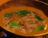 A picture of step 5 of Pasta sizzler sizzling with hot chilli powder, veggies, cheese.