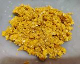 A picture of step 2 of Corn fritters in appe pan.