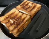 A picture of step 9 of Grilled Schezwan Aloo cheese sandwiches.