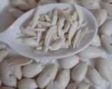 A picture of step 3 of Green Pistachio or white almond slivers.