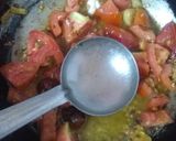 A picture of step 3 of Hyderbadi achri bindhi.