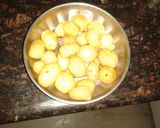 A picture of step 3 of Baby Potatoes Simmered In Rich Onion Tomato Gravy.