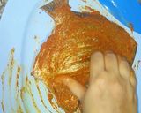 A picture of step 2 of Meen pollichathu/ Fish fried in banana leaf wrap.