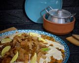 صورة لخطوة 4 من وصفة فتة ورق العنب بالمعكرونة