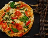 A picture of step 4 of Chapati Pizza.