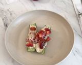 A picture of step 7 of Cucumber hummus boat.