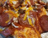 A picture of step 3 of Funtime Pizza with the Grandkids.