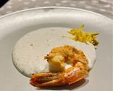 Foto del passaggio 4 della ricetta Crema di burrata al timo, zeste di limone e gamberone croccante all'arancia