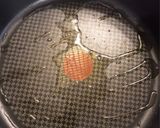 A picture of step 1 of Mirza Ghasemi (Mirza Qasemi)🍆🧄🥫🥚.