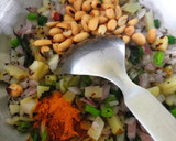 A picture of step 2 of Kanda Batata Poha.