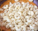 A picture of step 13 of Creamy Cheesy Schezwan Pasta.
