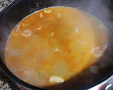 Foto del paso 25 de la receta: Sopa de marisco congelado y fresco con fondo de cebolletas