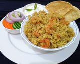 A picture of step 8 of Dindugal Talappakketti Biriyani.