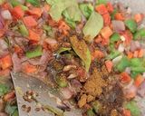 A picture of step 4 of Double tadka lahsuni Palak khichdi.