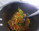 A picture of step 5 of Kathyawadi masala vegetable khichadi with masala curd, papad and 🌶.