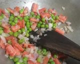A picture of step 2 of Mix vegetable rice.