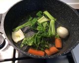 Foto del passaggio 3 della ricetta Fusilloni con polpo e crema di melanzane e porro, con datterini gialli