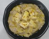 A picture of step 7 of Shahi paneer with white gravy.