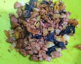 Foto del paso 7 de la receta: Pollo relleno de frutas pasas a la imperial al horno
