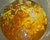 Foto del paso 3 de la receta: Sopa de pollo, fideos de arroz, espinacas y cilantro