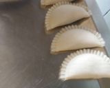 A picture of step 11 of Chicken half moons pie.