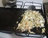 Foto del paso 2 de la receta: Merluza con quesos y verdeo al horno