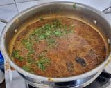 A picture of step 12 of Tomato Rasam vada.
