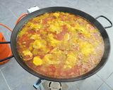 A picture of step 5 of Valencian Paella with Rabbit and Chicken.