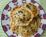 Foto del paso 3 de la receta Empanadita de pavo con jamón ibérico y cebolla