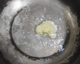 A picture of step 2 of Mustard leaves in Garlic sauce.